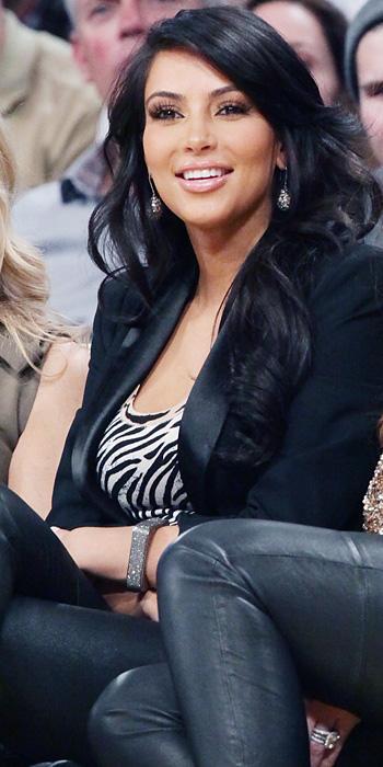 김 Kardashian 2011 Looks - black leather pants, a zebra top, and a black blazer