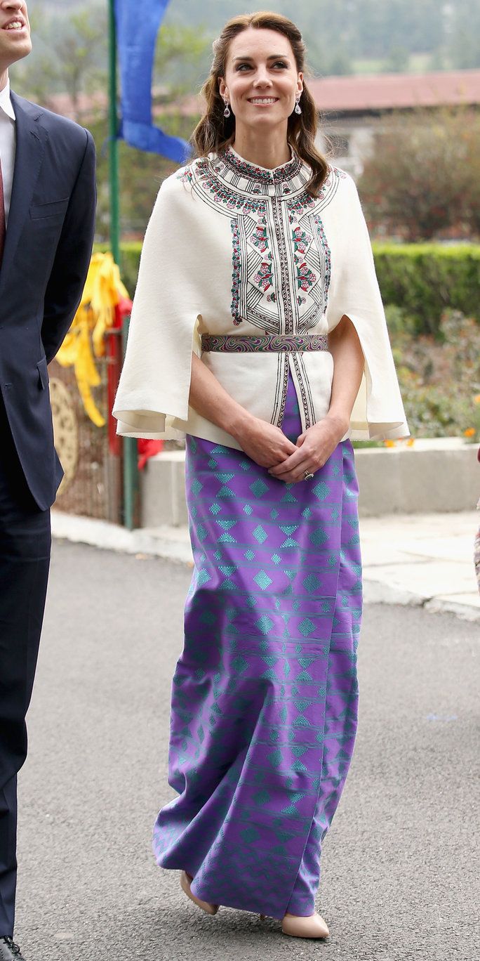 קתרין, Duchess of Cambridge walks with Prince William, Duke of Cambridge as part of a ceremonial Chipdrel on arrival into the Tashichhodzong (fortress) on the first day of a two day visit to Bhutan on the 14th April 2016 in Paro, Bhutan. The Royal cou