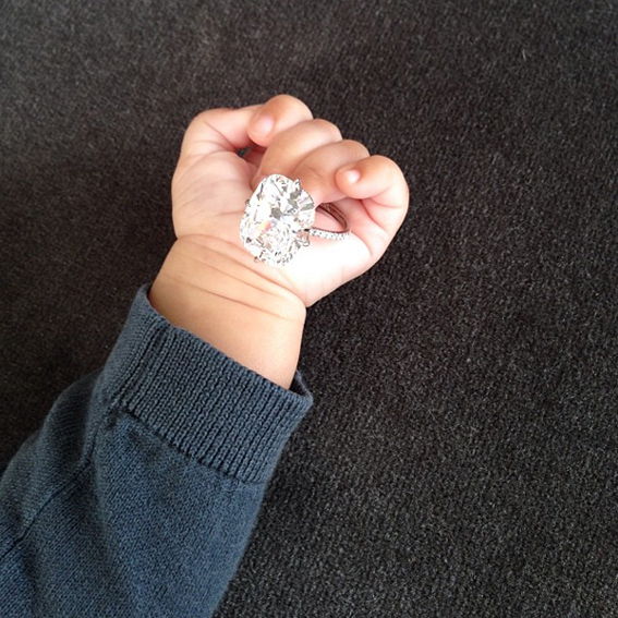 בייבי North West holding Kim Kardashian's engagement ring