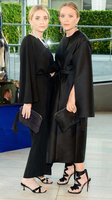 אשלי Olsen and Mary-Kate Olsen attend the 2014 CFDA fashion awards