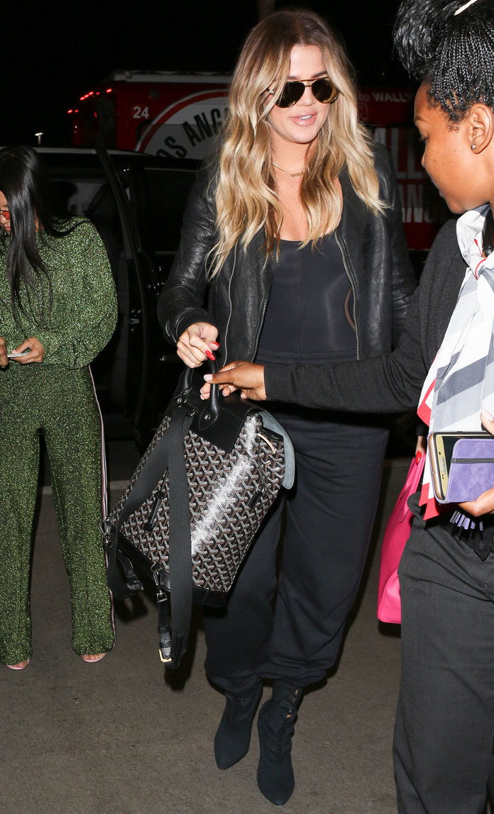 Khloe Kardashian Carries Goyard Back at the Airport