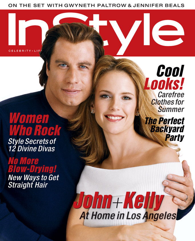 יולי 2001 Cover Stars John Travolta and Kelly Preston 