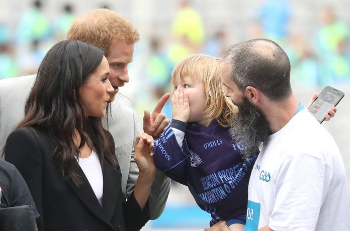 Meghan and Harry with a kid lead