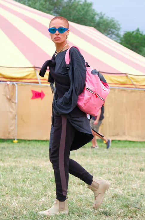 אדווה Aboah going matchy matchy with her Hunter Orignal boots and backpack at Glastonbury 2017 
